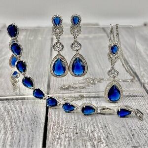 313. Elegant Glowing Blue Simulated Sapphire & CZ Gemstone Set